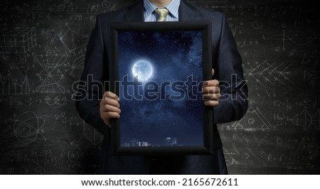 Full moon on night sky. Elements of this image furnished by NASA