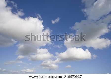 Clouds in sunny blue sky