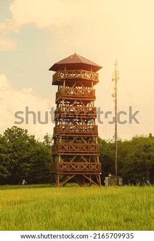 Watchtower on the green meadow on a sunny day.Summer season. High quality photo Royalty-Free Stock Photo #2165709935