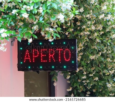 Panel with led and the text APERTO that means OPEN in Italian language