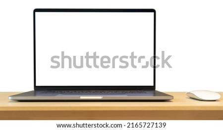Laptop with blank screen on wood table isolated on white background