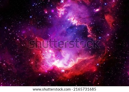 Bright purple space nebula. Elements of this image furnished by NASA. High quality photo