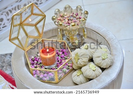 Moroccan Tyafer, traditional gift containers for the wedding ceremony, decorated with ornate golden embroidery.Moroccan henna .wedding gifts for the bride
