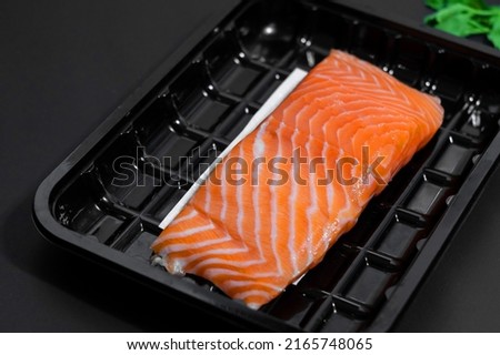 Salmon Raw Steak on  food absorbent with plastic packaging  in supermarket, Good quality for food store