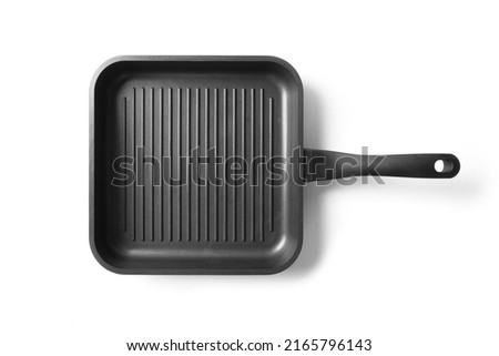 Empty cast iron grill pan with handle isolated on white background. View from above. Royalty-Free Stock Photo #2165796143