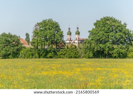 Ebersmunster Abbey in spring in central Alsace. Ebersmunter, Alsace, France. Royalty-Free Stock Photo #2165800569