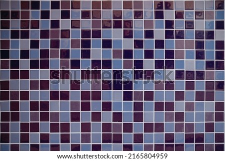 
Background of ceramic mosaic tiles in different shades of blue