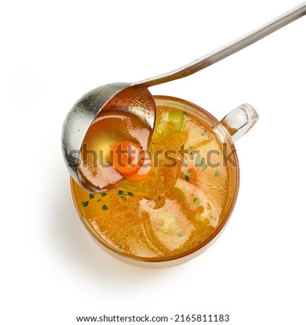 cup of fresh chicken bouillon isolated on white background, top view