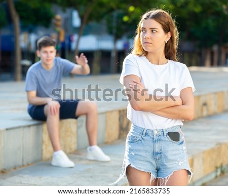 A couple of young people is having a quarrel Royalty-Free Stock Photo #2165833735