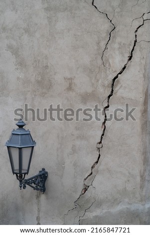 Closeup of cracked wall of house destroyed during strong earthquake in Tbilisi Georgia. Damage on buiding.  Royalty-Free Stock Photo #2165847721