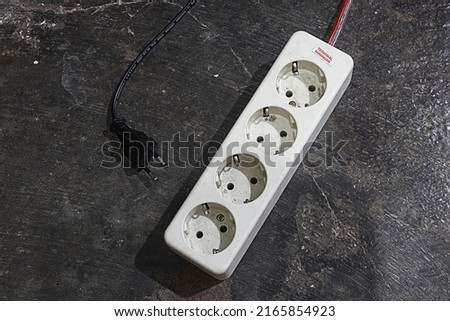 Plugs are technology used to connect electricity to electronic devices. Royalty-Free Stock Photo #2165854923