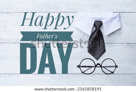 Father's day card background idea, Happy father's day banner with black necktie and white shirt collar with eyeglasse on white wood background