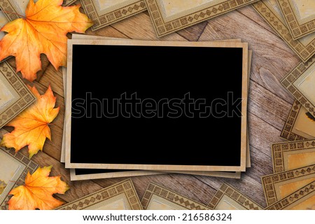 Grunge paper design in scrapbooking style with photoframe and autumn foliage