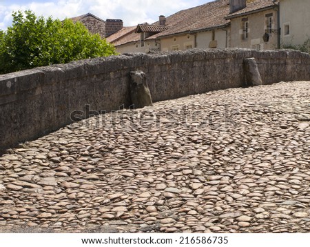 Cobblestone bridge in St Jean de Cole, Dordogne, France