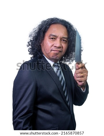 male gangster in a business suit with a knife isolated on white background 