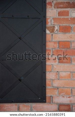 Black texture dark slate background. Red brick wall surface. Copy space