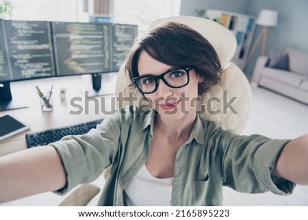Self-portrait of attractive cheerful skilled girl technician coder html database web developer at work place space indoors