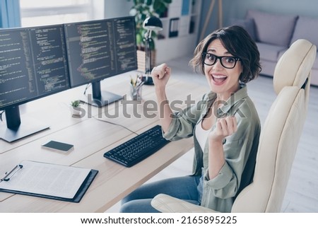 Photo of cheerful crazy female screaming hooray raise fists in triumph lucky fortunate office worker finished new project Royalty-Free Stock Photo #2165895225