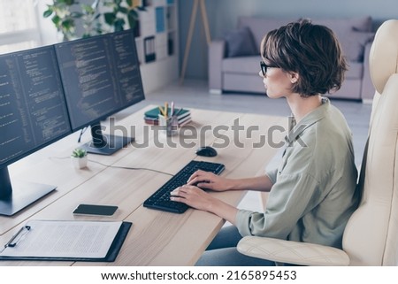 Profile side photo of smart woman it programmer create site professional developer web-designer work in office