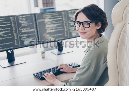 Photo of young professional web-designer woman creating new website write scripts coding in office workplace