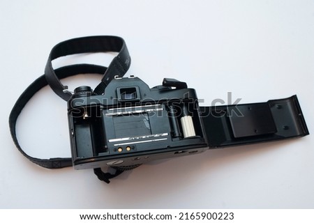 vintage film camera with open back door