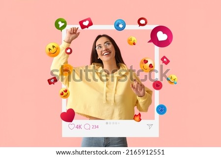 Happy young female blogger on pink background Royalty-Free Stock Photo #2165912551