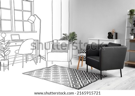 New interior of stylish living room with modern armchairs and workplace