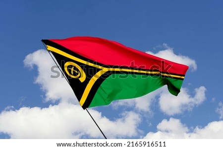 Vanuatu flag isolated on the blue sky with clipping path.