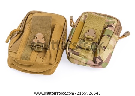 Two military tactical pouches for various purposes for fasten to unloading vest or bulletproof vest on a white background

