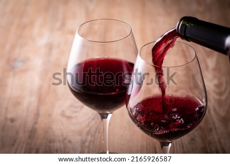 Pour red wine and enjoy together