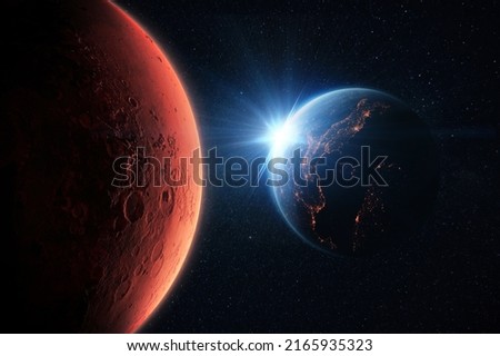 New Space Mission. Amazing red planet Mars and Beautiful blue planet earth with the lights of the sun. Space Wallpaper and Journey to Mars  Royalty-Free Stock Photo #2165935323
