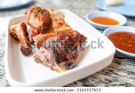food and drink, grilled chicken on a white plate on the dining table