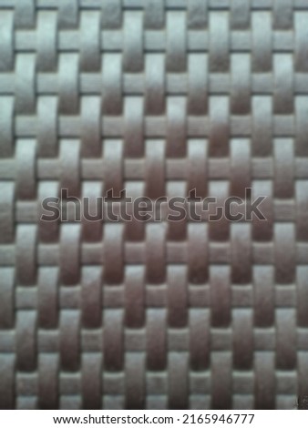 Layout of brown woven stripes. Defocused background