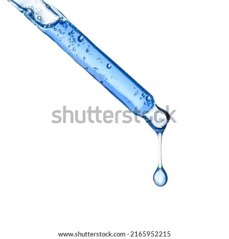 Glass cosmetic pipette dropper with blue skincare serum and hanging liquid drop, isolated on white background Royalty-Free Stock Photo #2165952215