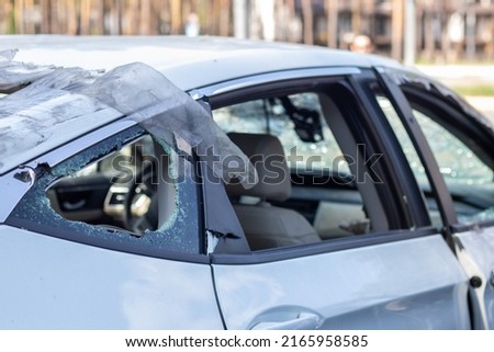 Traffic accident on the street, damaged car after a collision in the city. Accident due to speeding and alcohol intoxication. Transport background. The concept of road safety and insurance
