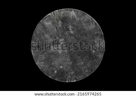 transparent adhesive round plastic sticker label isolated on black background
