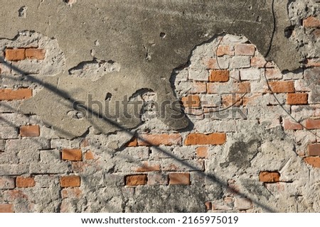 abstract background with a selective focus on ruined plaster on the wall as a map. Overlay effect for photo and design