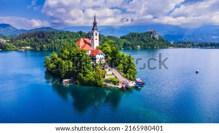 Bled, Slovenia. Amazing Bled Lake, island and church with Julian Alps mountain range background, Europe spotlight. Royalty-Free Stock Photo #2165980401