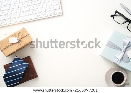Father's day gift idea background design concept with gift boxdesign concept on office table.