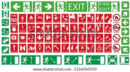 Fire action signs. Way signs for evacuation during a fire. Royalty-Free Stock Photo #2166060509