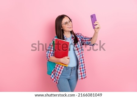 Photo of young adorable student female make selfie first day at university isolated on pink color background