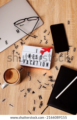 postcard. I need a vacation. gift. surprise.on the table is a gift card