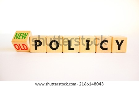 New or old policy symbol. Turned wooden cubes changed concept words Old policy to New policy. Beautiful white table white background. Business old or new policy concept. Copy space. Royalty-Free Stock Photo #2166148043