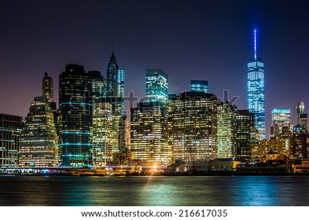 The Manhattan Skyline at night, seen from Brooklyn Bridge Park, Brooklyn, New York.