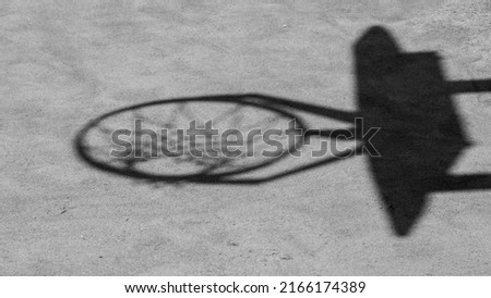 
Shadow on the floor of a basketball hoop, close-up.
 Royalty-Free Stock Photo #2166174389