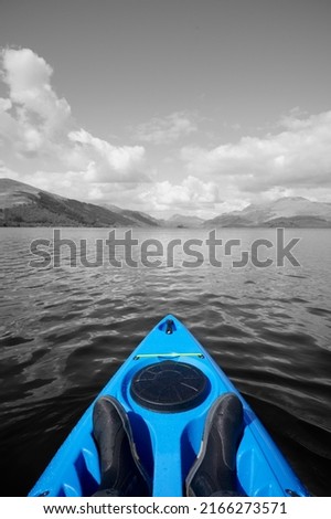Blue kayak on open water at Loch Lomond