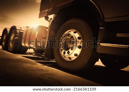 Front of Semi Truck Wheels Tires. Auto Service Shop. Chrome Wheels. Rubber, Vechicle Tyres. Freight Trucks Cargo Transport Logistics.