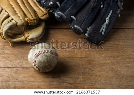 Vintage classic leather baseball glove and baseball ball isolated on white background
