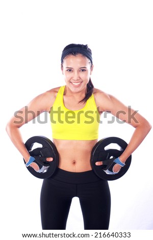 Women athletes exercise to burn fat with yoga and exercise using dumbbell . Beautiful sporty fit yogini woman
 doing yoga practice on White background-concept,healthy life and natural balance