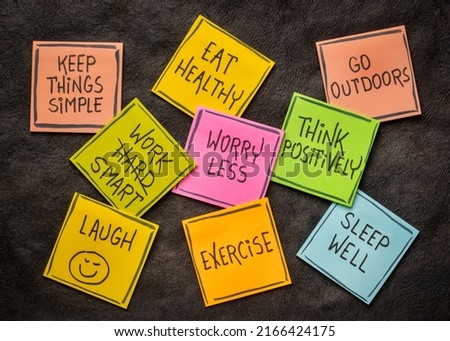 healthy lifestyle and wellbeing concept - a set of inspirational reminder notes against black textured paper Royalty-Free Stock Photo #2166424175